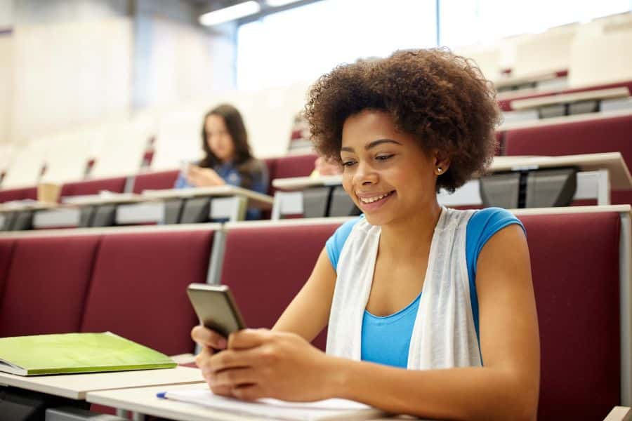 student sitting in a lecture at tut