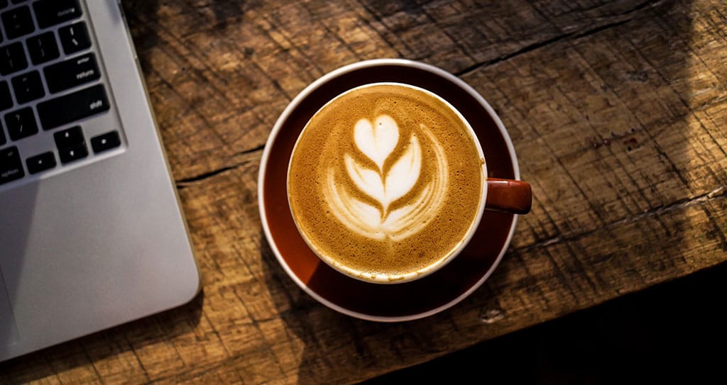 11 Holiday Job Ideas for Students 6 cappuccino-with-laptop-on-desk