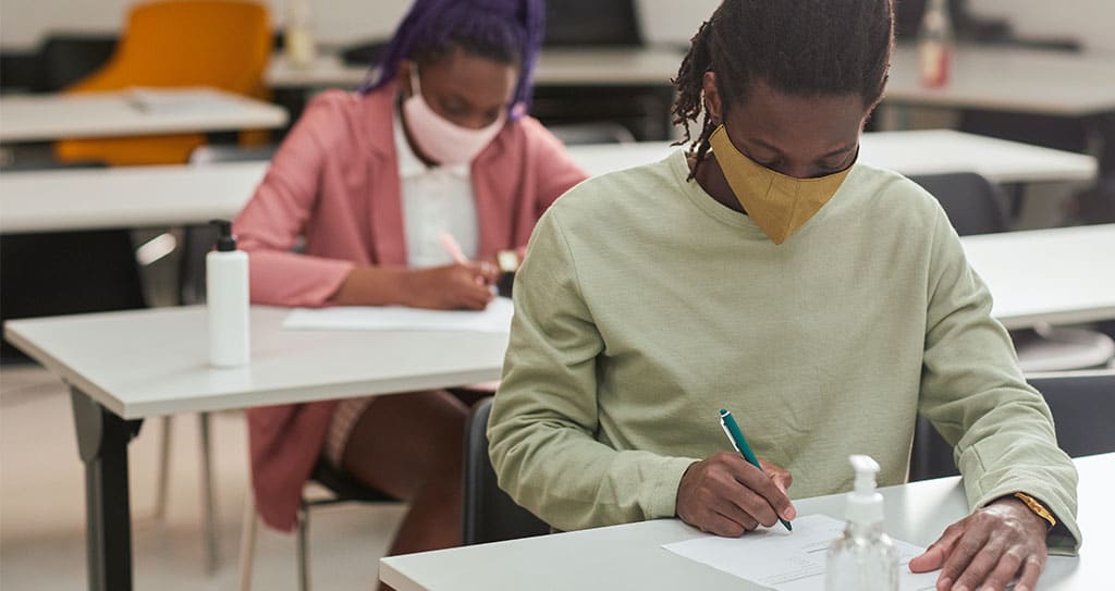 students-wearing-maks-while-writing-exams