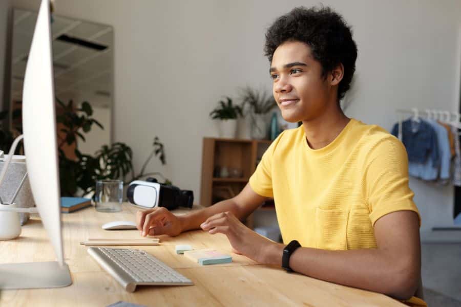 teenager attending class via online learning