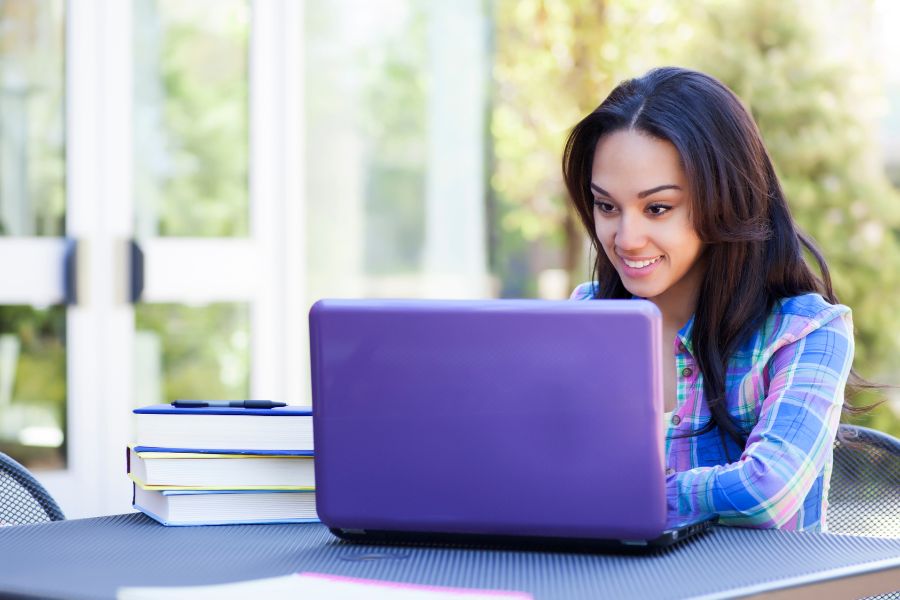 young woman studying adult matric via distance learning