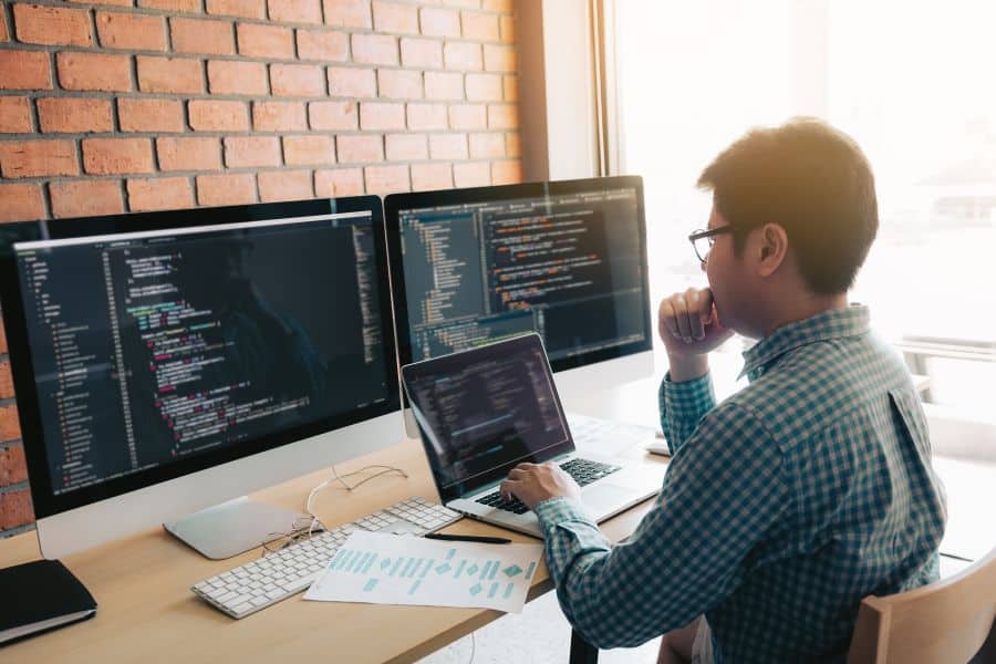 junior software developer working at their desk