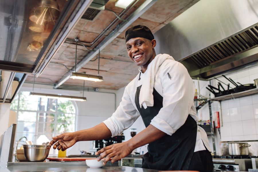 chef preparing food in the kitchen showcasing skilled trades