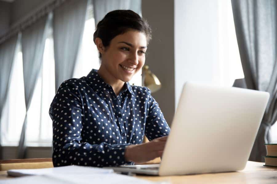 woman using one of the most affordable laptops in south africa